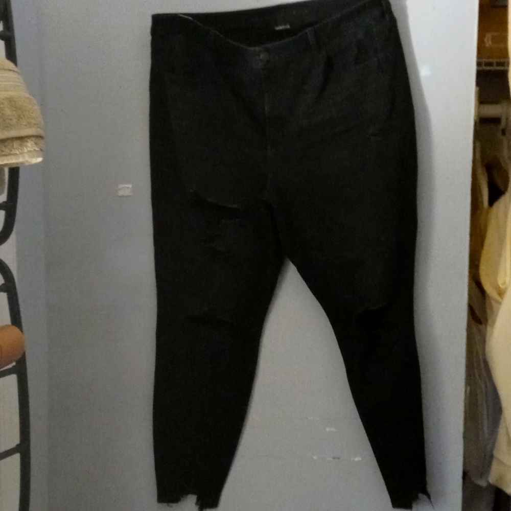 Black distressed jeans.